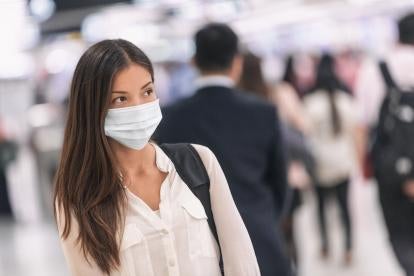Employee wearing mask at work during the coronavirus pandemic 