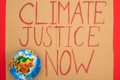Climate Justice protest sign found outside the EPA offices