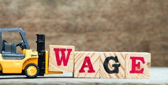 Caddies Prevail in Wage Suit