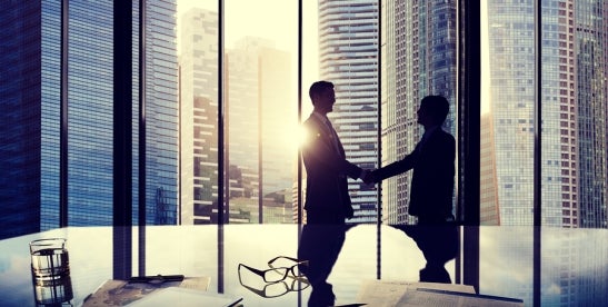 shaking hands after coming to a litigious agreement
