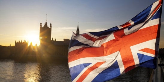 England's iconic Union Jack flapping in front of Parliament