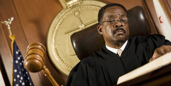 judge wielding a gavel in Delaware