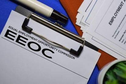 EEOC equal employment opportunity commission on clipboard 