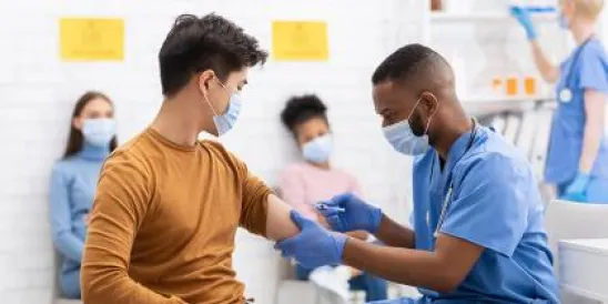 person getting covid-19 vaccine 