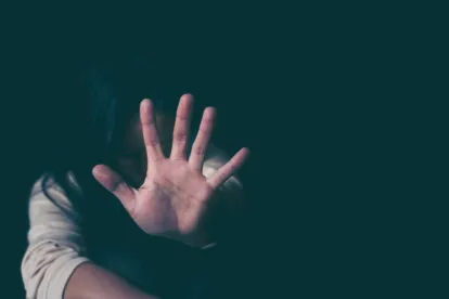 woman with hand over face