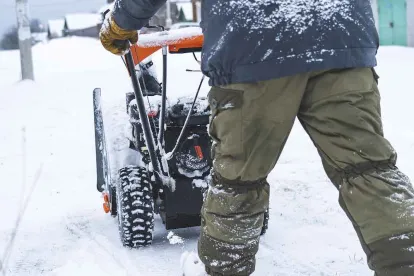 Snow Removal and Man with Snow Blower
