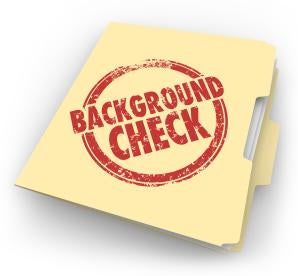 office folder with a red Background Check Stamp