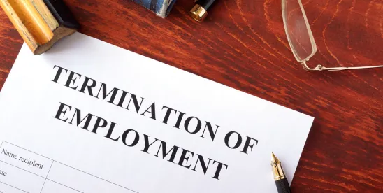 termination of employment contract with a pen, spectacles and other office items 
