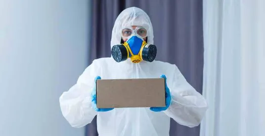 Man in Hazmat Suit Doing Toxic Chemical Clean-Up