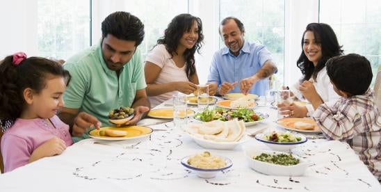 family having thanksgiving dinner without being interrupted by phonecalls