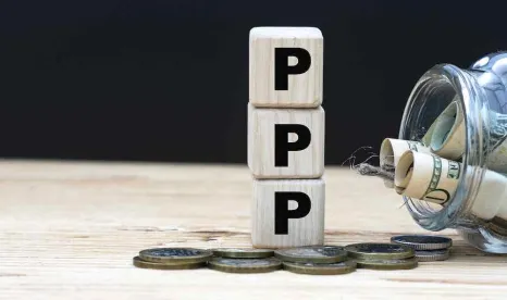 PPP loan with money and jar 