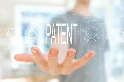 Patent in text over an aoutstretched hand