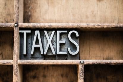 wood, iron, block letters, taxes