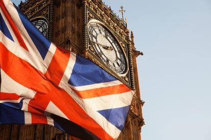 Big Ben and the Union Jack United Kingdom flag in clean air