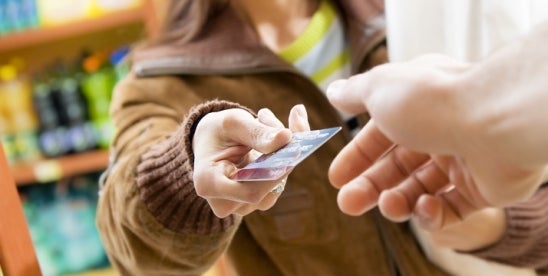 woman with credit card, fcra, consumer rights