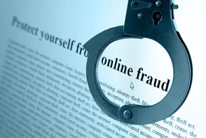online fraud in handcuffs