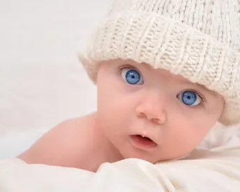 baby wearing hat, fetal heart monitor, new york