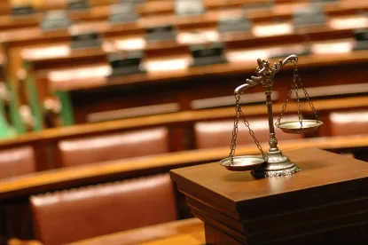Courtroom Scales, Enforceability Of Exclusive Forum Bylaw May Hinge On Meaning Of “May”