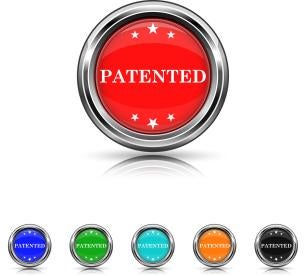 set of 6 buttons stating patented in colors: red, navy, green, light blue, orange, black