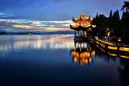 chinese structure by a lake in china