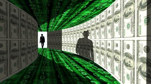 cyber crime and ransomware attacks occur in money-lined digital hallways