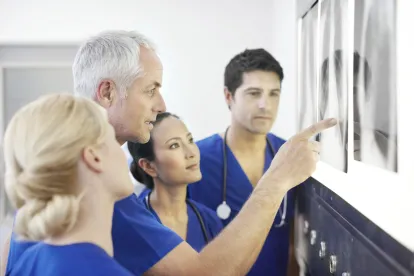 Doctors looking at xray