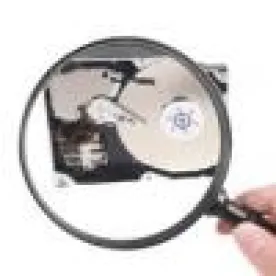 hard drive, magnifying glass, ediscovery