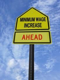 Road Sign, District of Columbia Passes Minimum Wage Increase
