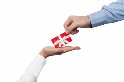 a gift card being presented during the holiday season