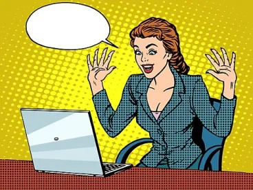 woman surprised at laptop email received