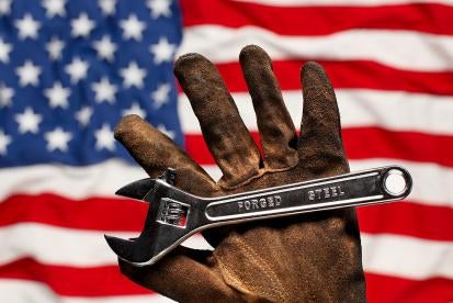the hand of the working man and the spanner of his wife