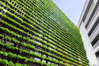 greenhouse on the side of a parking building in california