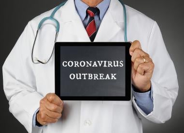 doctor with coronavirus on ipad 