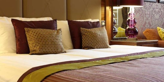 Hotel bed Hoteliers New Hampshire Sustain Covered BI Loss Coronavirus