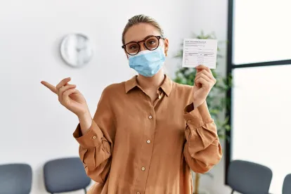 Vaccinated Woman Following CDC Protocol