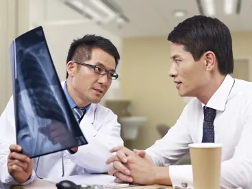 doctors discussing new life sciences technology