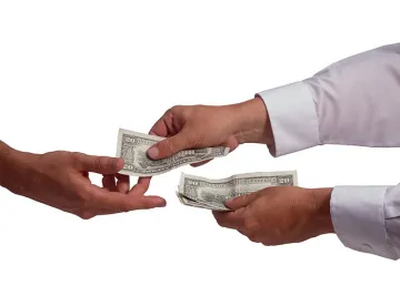 Hands exchanging Money