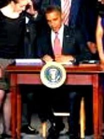 President Obama signing Patent Reform
