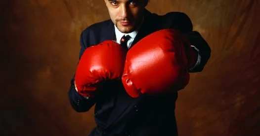 business man with boxing gloves
