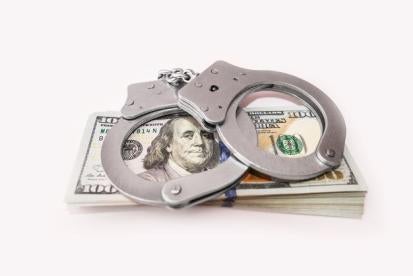 Financial Crimes Handcuffs for Future Trading Fraud