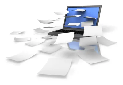 computer with paper, sensitive emails