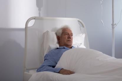 an elderly man contemplates his litigation options in a drab hospital room