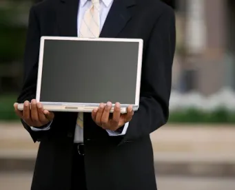 holding laptop, seo, law firm