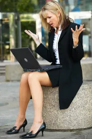 Business Lady Upset with Computer Post 
