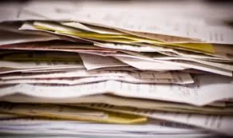 stack of forms, irs audit, hardship distributions