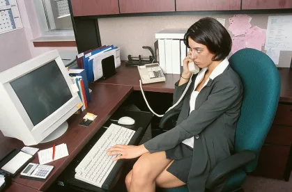 Office worker checking voicemail