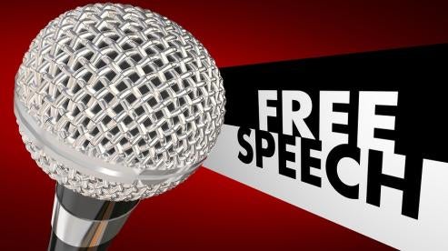 two free speech words and a microphone