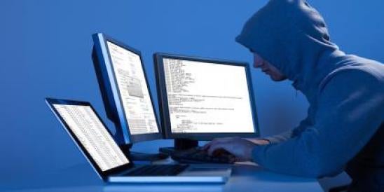 hacker at computers, OCR, data breach